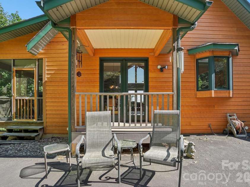 1000 Reems Cove Road, Marshall, NC 28753.  MLS# CAR4428034, YatesRealty ID 52754. Great relaxing area in back.