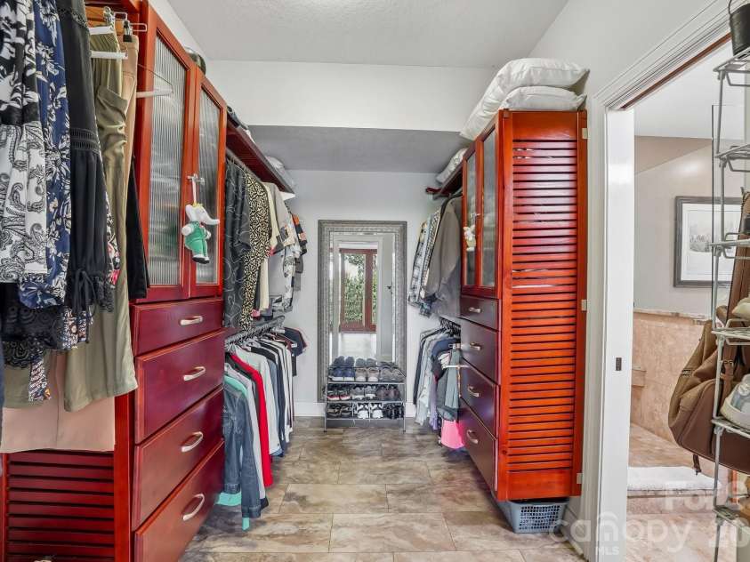 1000 Reems Cove Road, Marshall, NC 28753.  MLS# CAR4428034, YatesRealty ID 52754. Master Walk-in closet