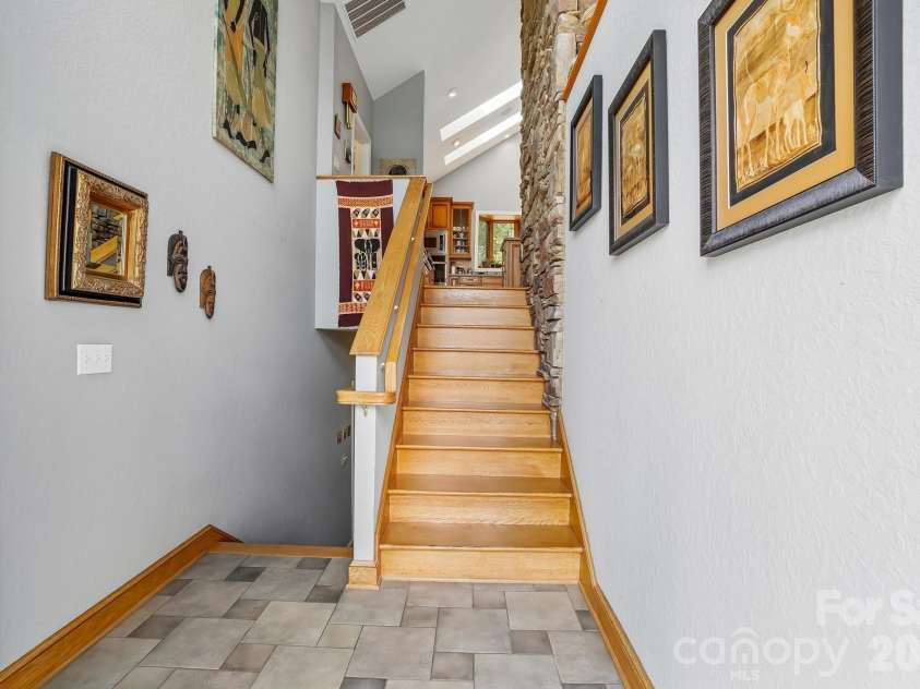 1000 Reems Cove Road, Marshall, NC 28753.  MLS# CAR4428034, YatesRealty ID 52754. Steps to main level from front entrance