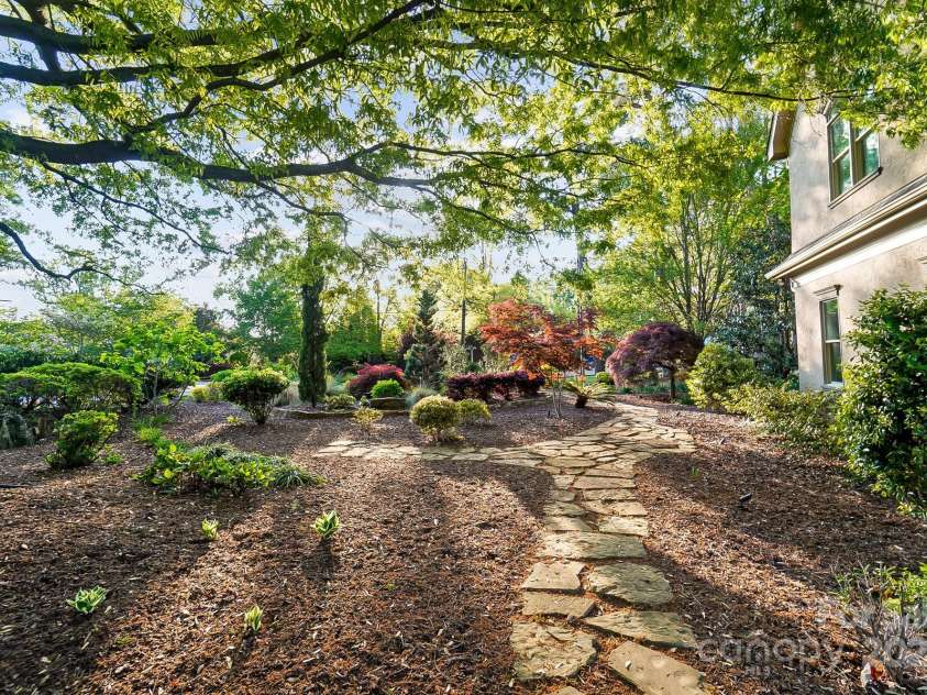 20428 Island Forest Drive, Cornelius, NC 28031.  MLS# CAR4243921, YatesRealty ID 5277. .92 acres of privacy and lush oasis setting.