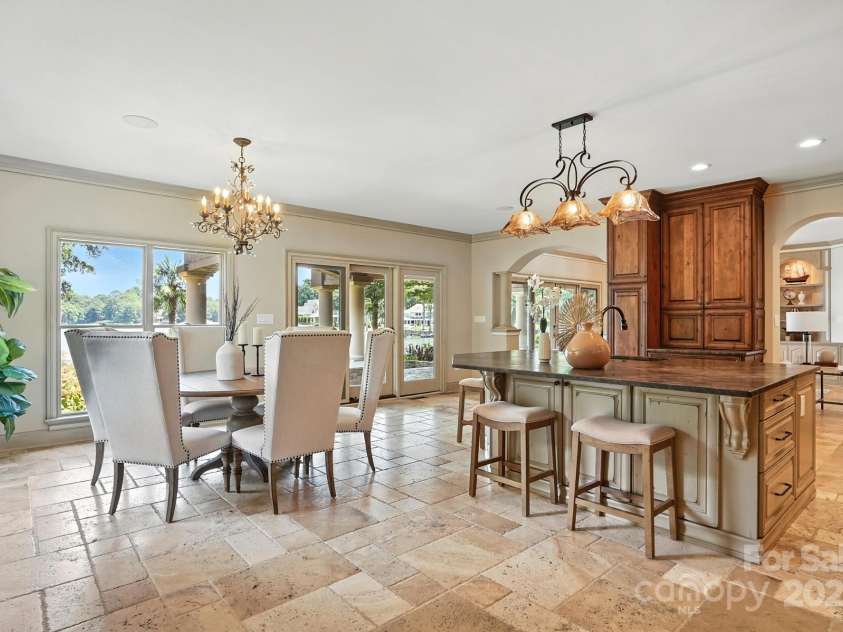 20428 Island Forest Drive, Cornelius, NC 28031.  MLS# CAR4243921, YatesRealty ID 5277. Custom cabinets include soft close, pull out drawers and paneled appliances.