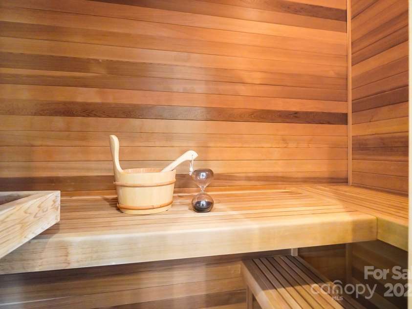20428 Island Forest Drive, Cornelius, NC 28031.  MLS# CAR4243921, YatesRealty ID 5277. Enjoy a relaxing sauna after your workout!