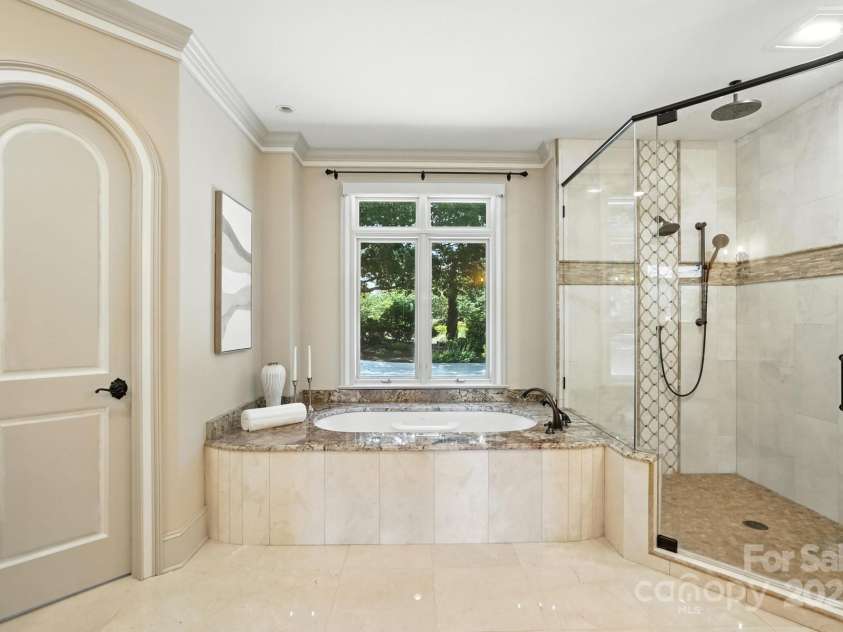 20428 Island Forest Drive, Cornelius, NC 28031.  MLS# CAR4243921, YatesRealty ID 5277. Gorgeous custom bathroom with heated floors