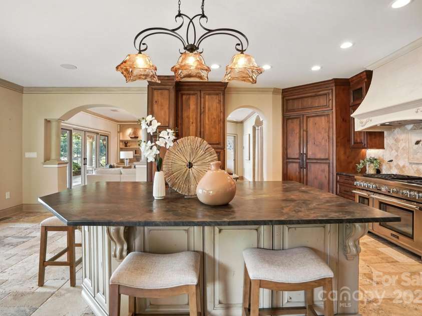 20428 Island Forest Drive, Cornelius, NC 28031.  MLS# CAR4243921, YatesRealty ID 5277. Perfectly sized center island.