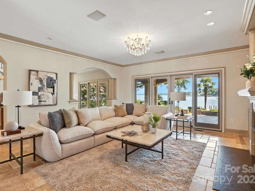 20428 Island Forest Drive, Cornelius, NC 28031.  MLS# CAR4243921, YatesRealty ID 5277. Serene Living Room with private views of the water.