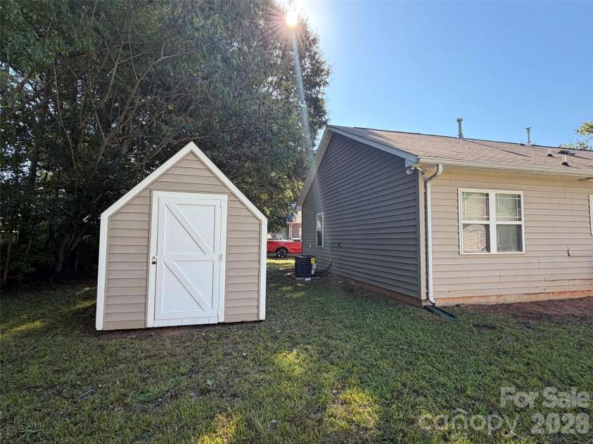 9727 Psalms Street, Cornelius, NC 28031.  MLS# CAR4425511, YatesRealty ID 52789. Backyard