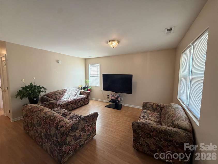 9727 Psalms Street, Cornelius, NC 28031.  MLS# CAR4425511, YatesRealty ID 52789. Livingroom