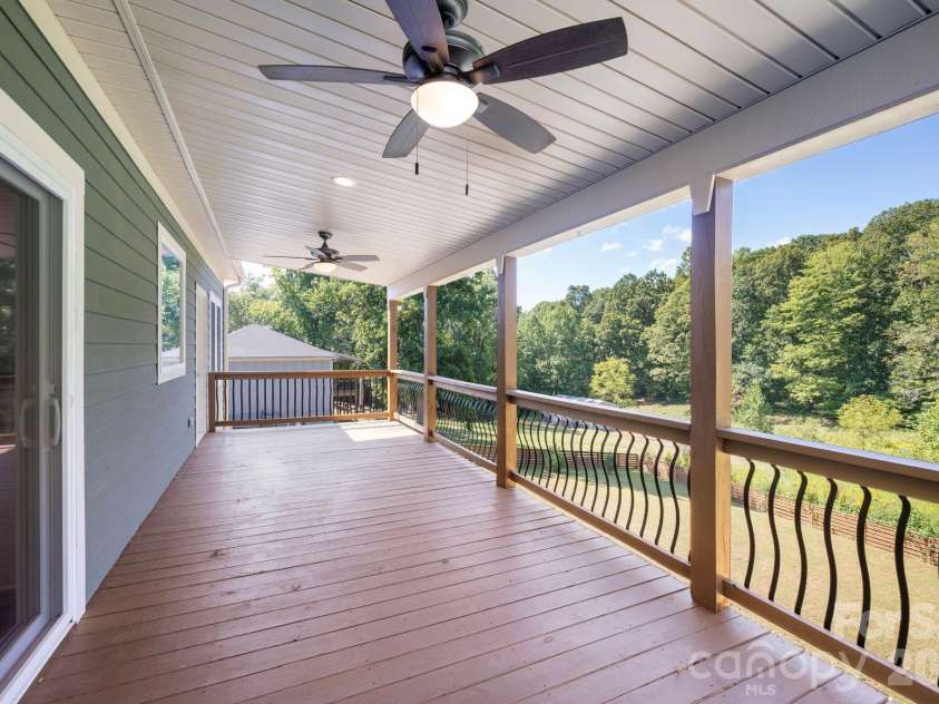 139 Ridge Road, Candler, NC 28715.  MLS# CAR4426704, YatesRealty ID 52790. Covered back deck off the living room