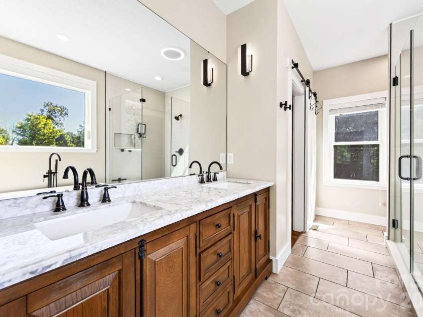 139 Ridge Road, Candler, NC 28715.  MLS# CAR4426704, YatesRealty ID 52790. Dual vanities