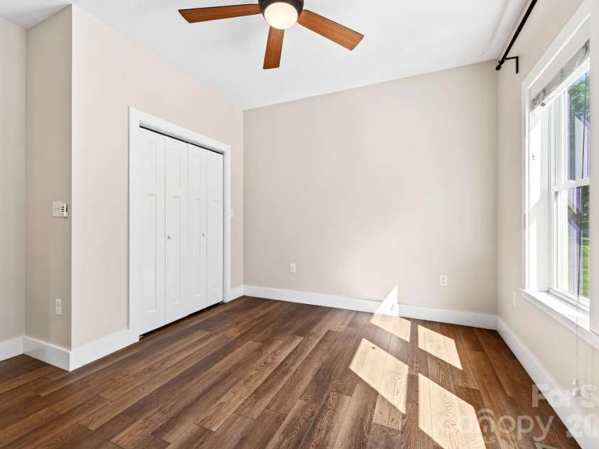 139 Ridge Road, Candler, NC 28715.  MLS# CAR4426704, YatesRealty ID 52790. Front Bedroom
