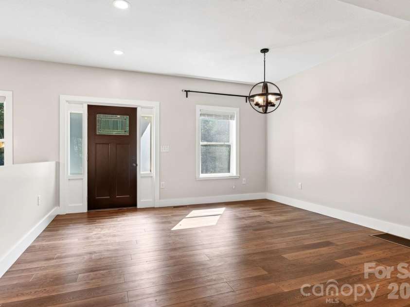 139 Ridge Road, Candler, NC 28715.  MLS# CAR4426704, YatesRealty ID 52790. Walk into the main living space