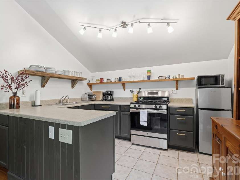 723 Highland Road, Mill Spring, NC 28756.  MLS# CAR4370173, YatesRealty ID 52794. 2nd Qtr Kitchen