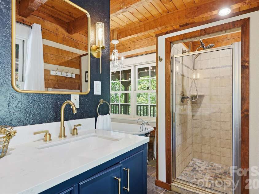 723 Highland Road, Mill Spring, NC 28756.  MLS# CAR4370173, YatesRealty ID 52794. Primary Bath