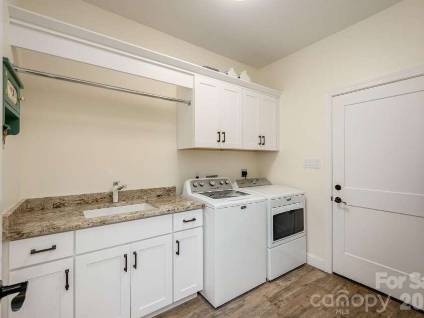 8 MANORWOOD Court, Flat Rock, NC 28731.  MLS# CAR4428068, YatesRealty ID 52817. Laundry