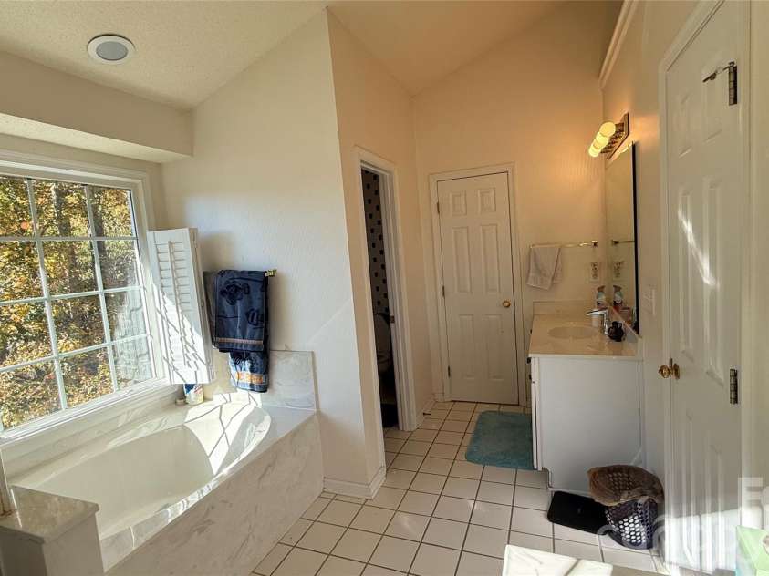 2836 Pickering Road, Greensboro, NC 27407.  MLS# CAR4275274, YatesRealty ID 5282. Primary bathroom