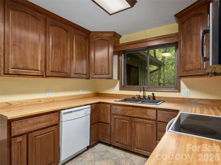 15 Cedarbrook Drive, Laurel Park, NC 28739.  MLS# CAR4428291, YatesRealty ID 52843. 