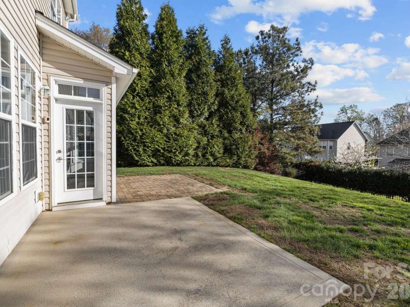 13803 Daltrey Lane, Charlotte, NC 28277.  MLS# CAR4357515, YatesRealty ID 5285. Back Patio