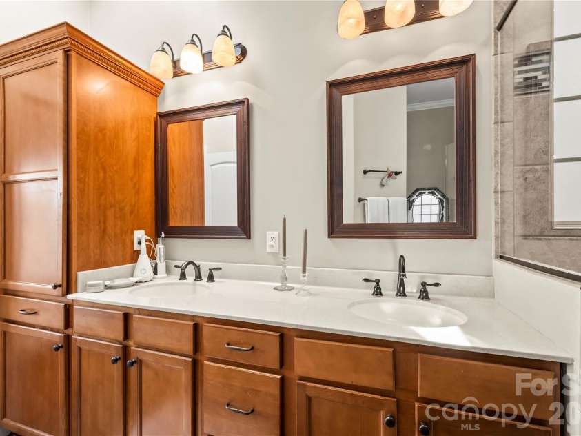 27 Dreambird Drive, Leicester, NC 28748.  MLS# CAR4424552, YatesRealty ID 52857. Dual vanities in primary bath