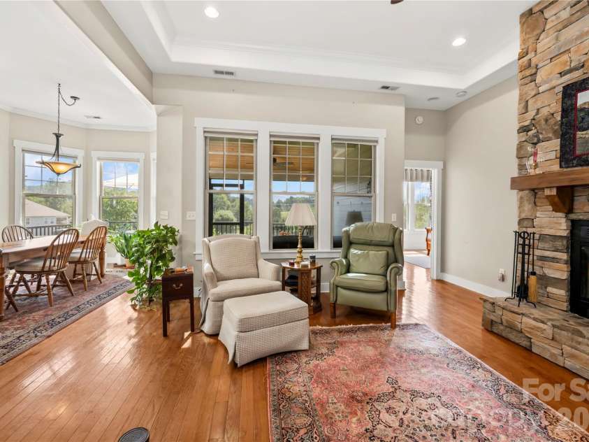 27 Dreambird Drive, Leicester, NC 28748.  MLS# CAR4424552, YatesRealty ID 52857. Open living and dining