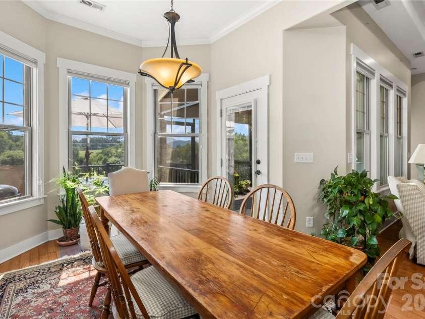 27 Dreambird Drive, Leicester, NC 28748.  MLS# CAR4424552, YatesRealty ID 52857. Those dining room views!