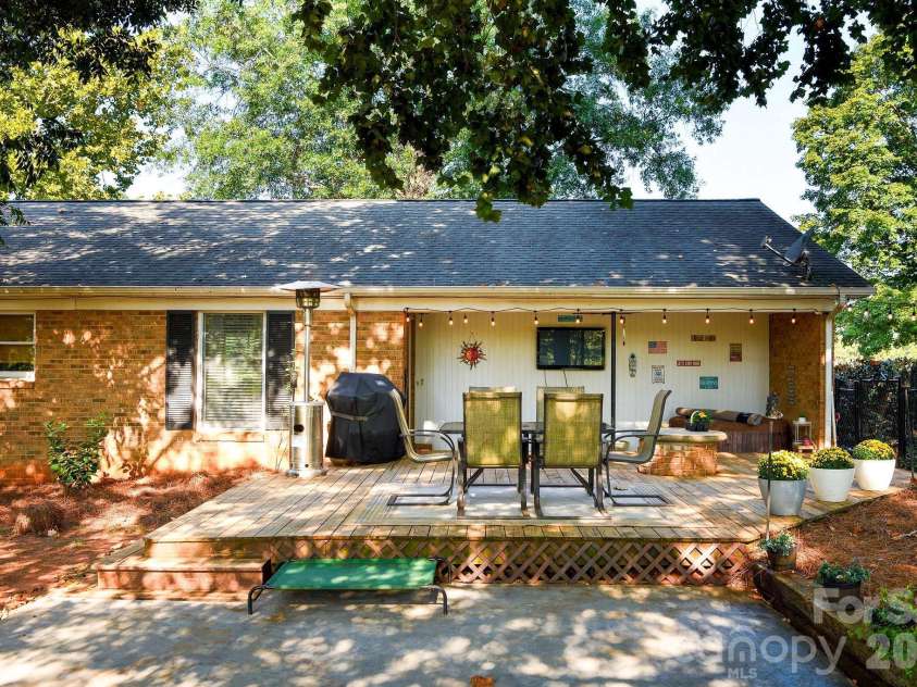 3910 Fallston Road, Shelby, NC 28150.  MLS# CAR4427337, YatesRealty ID 52858. Covered patio area AND a deck in the private back yard!