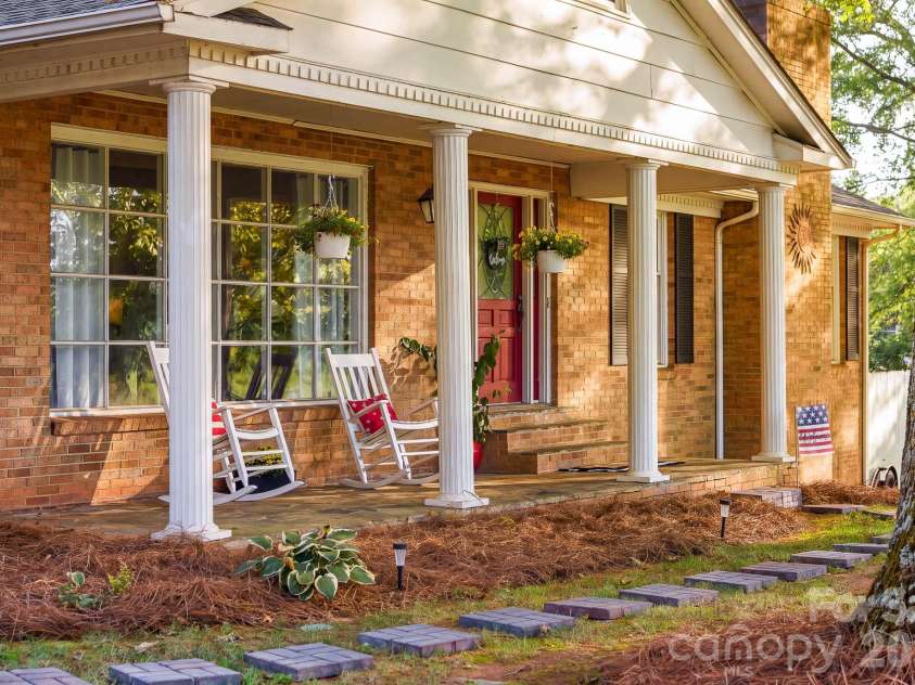 3910 Fallston Road, Shelby, NC 28150.  MLS# CAR4427337, YatesRealty ID 52858. Gorgeous rocking chair front porch!!