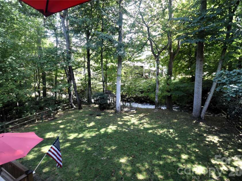 98 Indian Trace Road, Maggie Valley, NC 28751.  MLS# CAR4427039, YatesRealty ID 52864. Another creek view from the upper deck