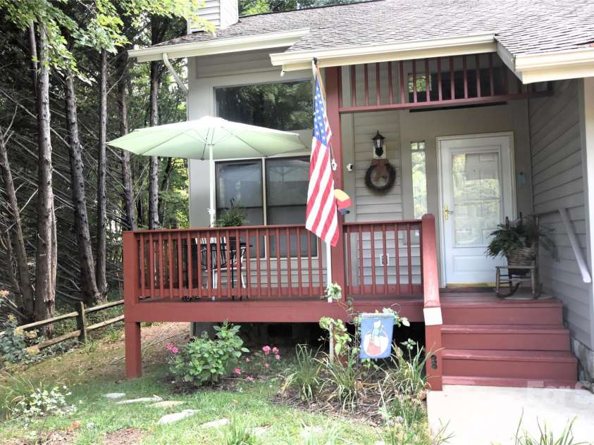 98 Indian Trace Road, Maggie Valley, NC 28751.  MLS# CAR4427039, YatesRealty ID 52864. Covered Front Porch