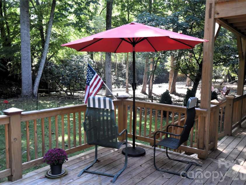 98 Indian Trace Road, Maggie Valley, NC 28751.  MLS# CAR4427039, YatesRealty ID 52864. Eating area on the back deck