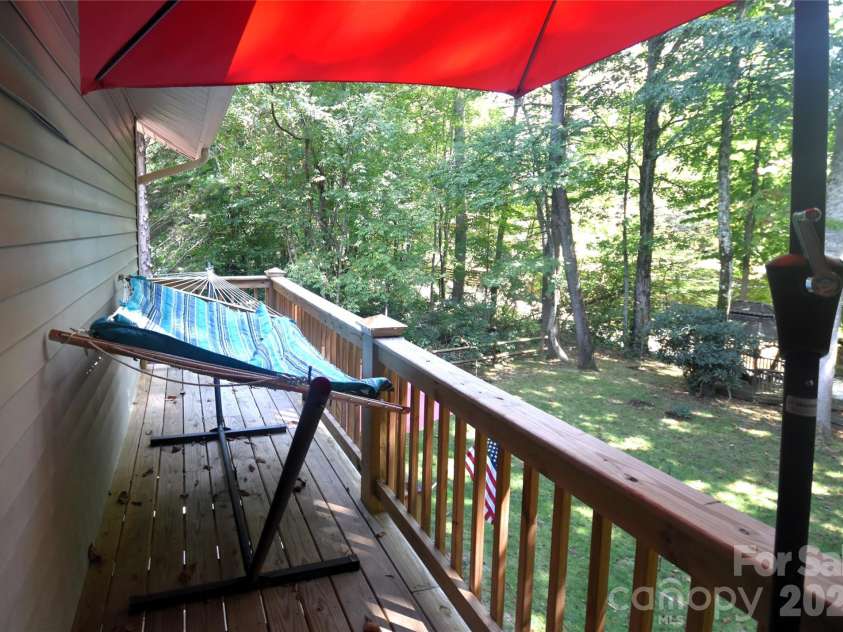 98 Indian Trace Road, Maggie Valley, NC 28751.  MLS# CAR4427039, YatesRealty ID 52864. Hammock on the upper deck in the rear