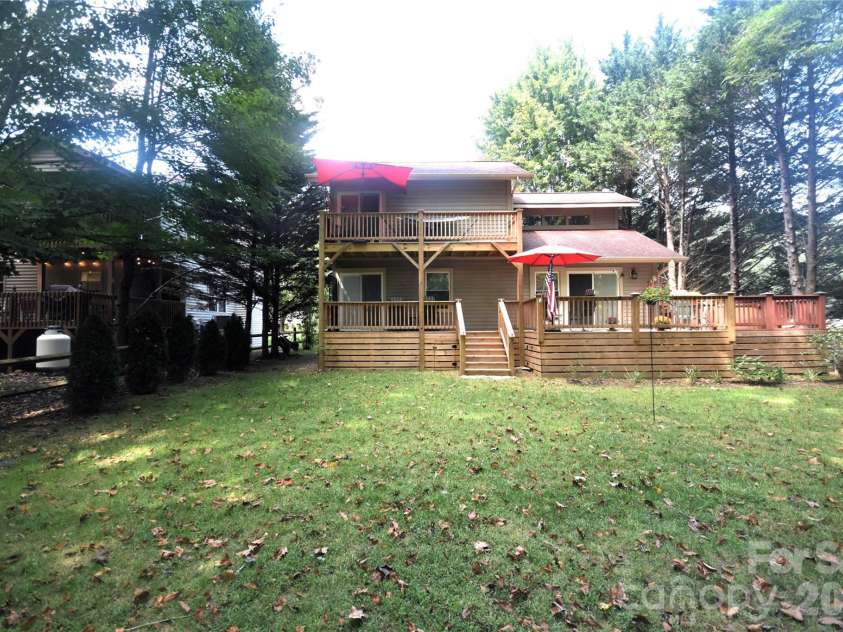98 Indian Trace Road, Maggie Valley, NC 28751.  MLS# CAR4427039, YatesRealty ID 52864. Home as seen from the backyard