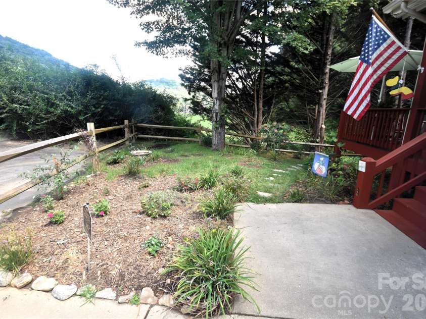 98 Indian Trace Road, Maggie Valley, NC 28751.  MLS# CAR4427039, YatesRealty ID 52864. Landscaped Area in the front