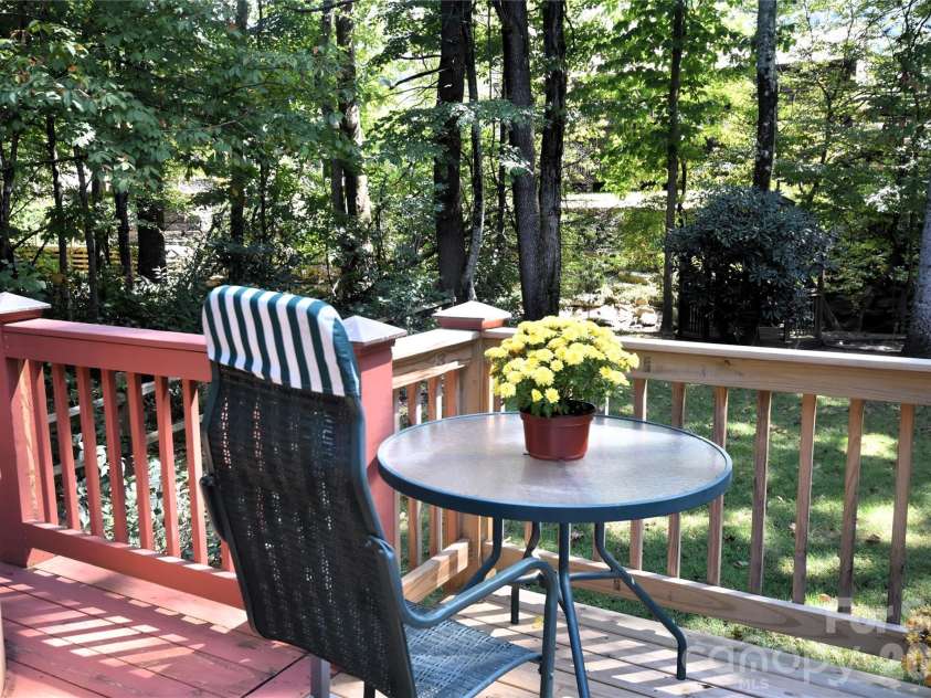 98 Indian Trace Road, Maggie Valley, NC 28751.  MLS# CAR4427039, YatesRealty ID 52864. More of the back deck