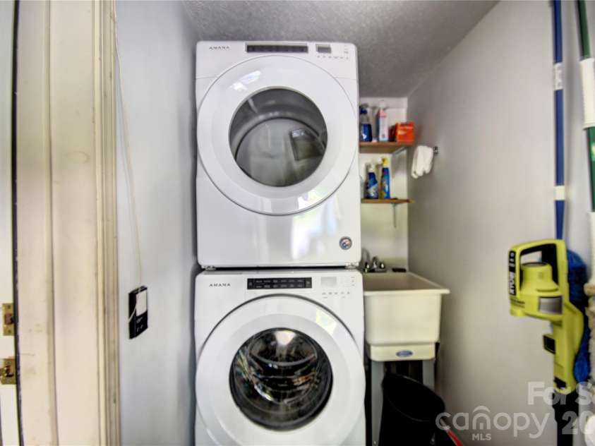 98 Indian Trace Road, Maggie Valley, NC 28751.  MLS# CAR4427039, YatesRealty ID 52864. Stack Laundry in the Garage