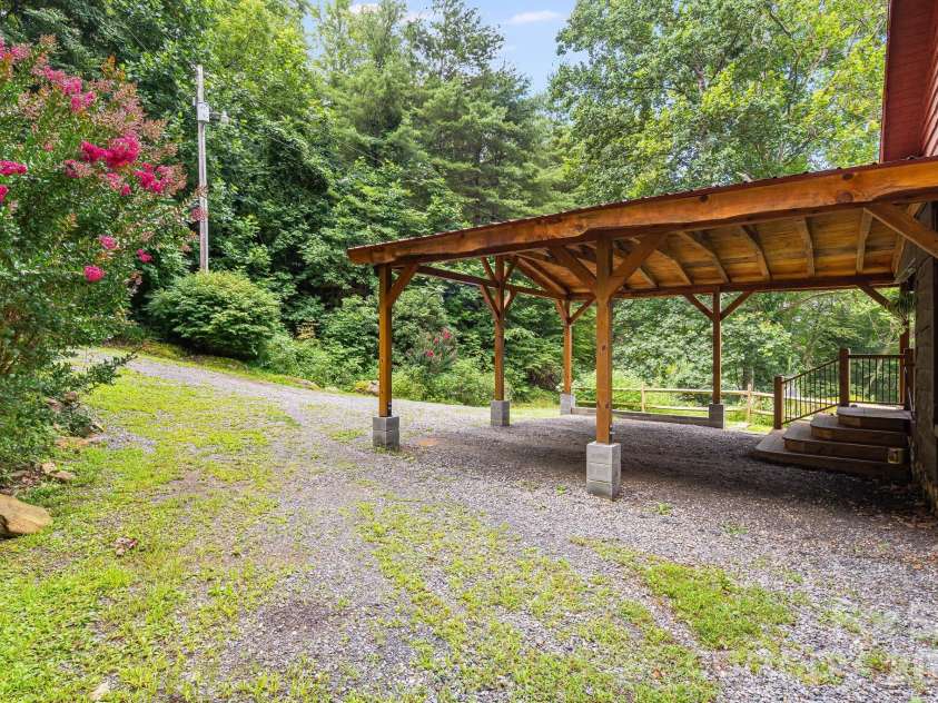 125 Hyacinth Drive, Clyde, NC 28721.  MLS# CAR4409445, YatesRealty ID 52893. Carport