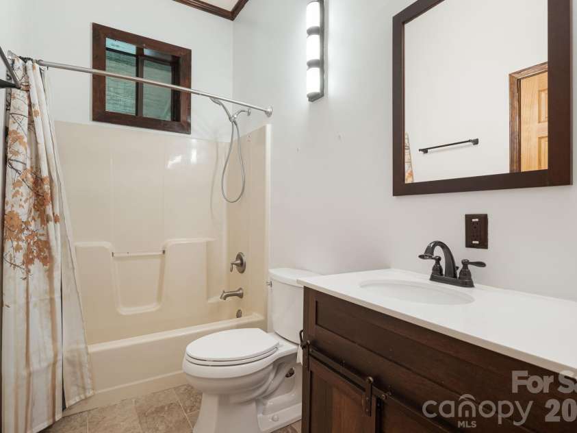 125 Hyacinth Drive, Clyde, NC 28721.  MLS# CAR4409445, YatesRealty ID 52893. Primary Bath