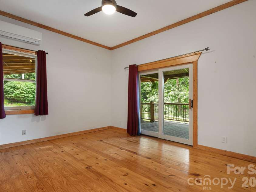 125 Hyacinth Drive, Clyde, NC 28721.  MLS# CAR4409445, YatesRealty ID 52893. Primary Bedroom