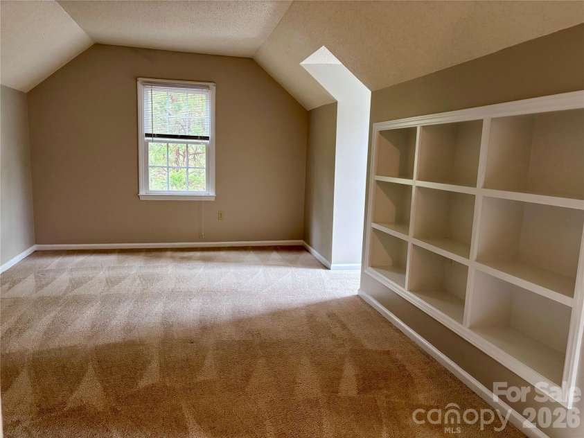 8600 Beeswood Drive, Charlotte, NC 28277.  MLS# CAR4427788, YatesRealty ID 52897. Bedroom 4 with built-ins