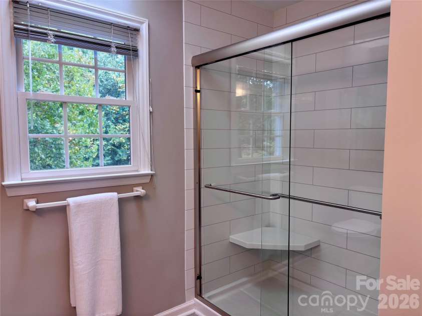 8600 Beeswood Drive, Charlotte, NC 28277.  MLS# CAR4427788, YatesRealty ID 52897. Easy Care Grout-less Shower