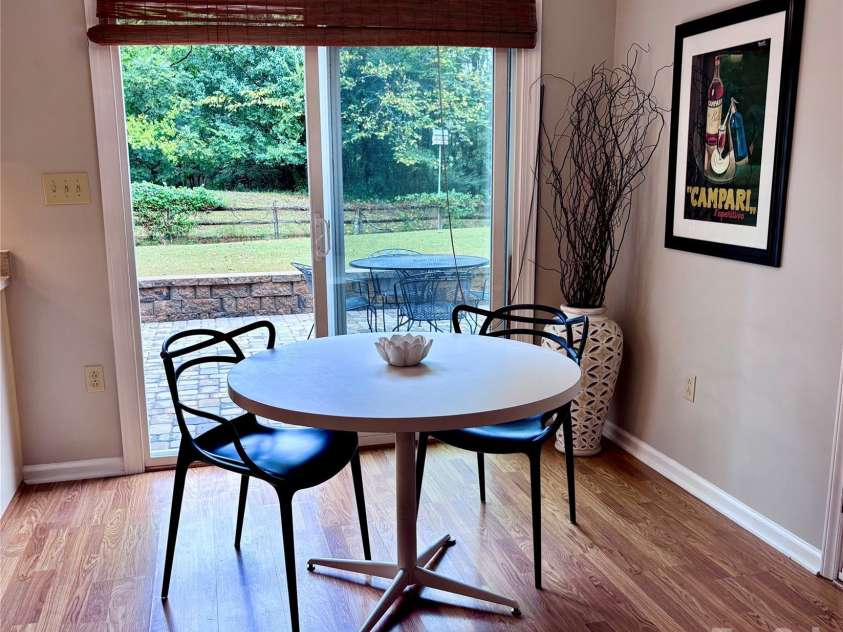 8600 Beeswood Drive, Charlotte, NC 28277.  MLS# CAR4427788, YatesRealty ID 52897. Kitchen Table Overlooking Private Back Yard