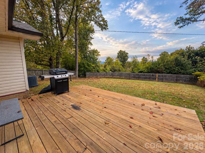 126 Stradley Mountain Road, Asheville, NC 28806.  MLS# CAR4428453, YatesRealty ID 52898. Large back deck