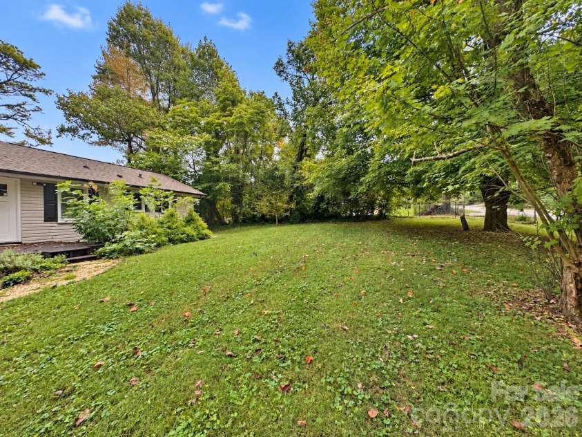 126 Stradley Mountain Road, Asheville, NC 28806.  MLS# CAR4428453, YatesRealty ID 52898. Large Front Yard