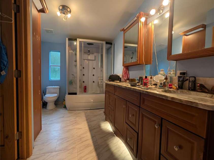 5732 Daybrook Court, Stanley, NC 28164.  MLS# CAR4426897, YatesRealty ID 52900. Primary bathroom