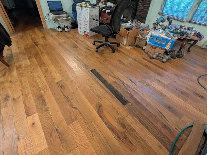5732 Daybrook Court, Stanley, NC 28164.  MLS# CAR4426897, YatesRealty ID 52900. Showing floor damage