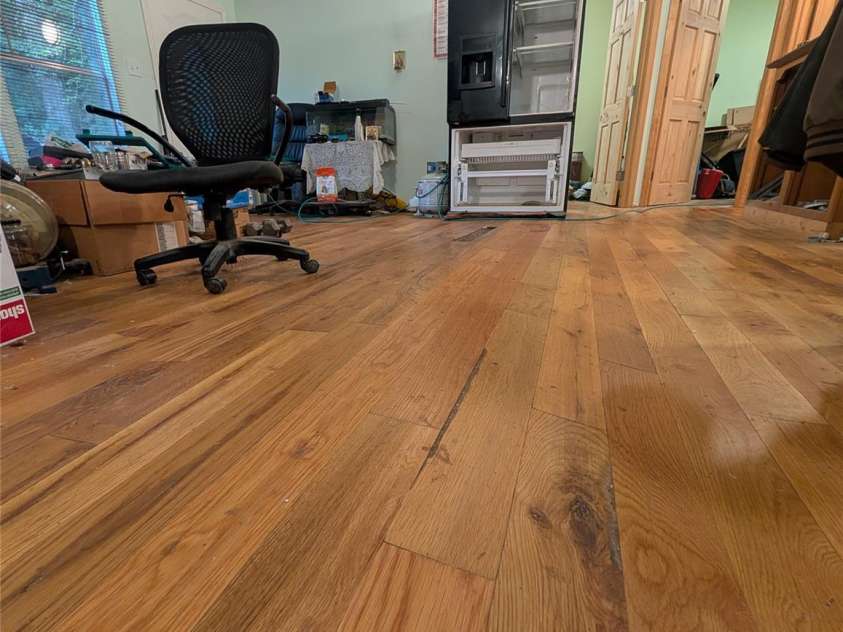 5732 Daybrook Court, Stanley, NC 28164.  MLS# CAR4426897, YatesRealty ID 52900. Showing floor damage
