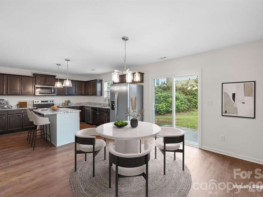 2824 Easton Knoll Drive, Dallas, NC 28034.  MLS# CAR4427656, YatesRealty ID 52907. Design idea for kitchen and dining area