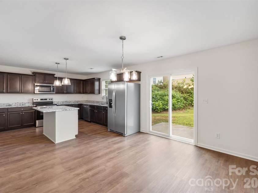 2824 Easton Knoll Drive, Dallas, NC 28034.  MLS# CAR4427656, YatesRealty ID 52907. Kitchen and dining area