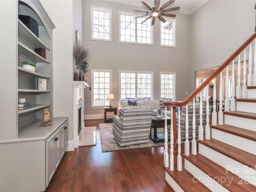 188 Wild Harbor Road, Mooresville, NC 28117.  MLS# CAR4239589, YatesRealty ID 5291. 2 Story Great Room with 2-story ceilings and view of the private backyard