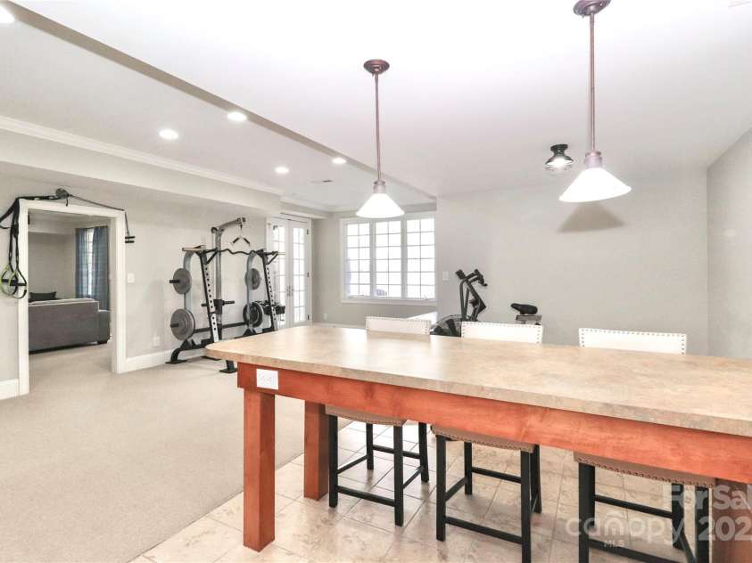 188 Wild Harbor Road, Mooresville, NC 28117.  MLS# CAR4239589, YatesRealty ID 5291. View of flex room used as an exercise area