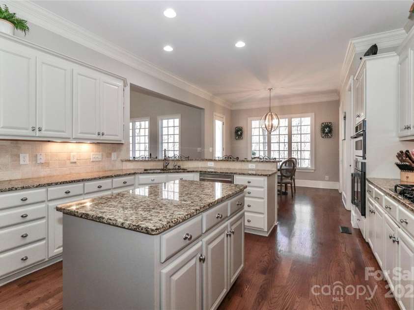 188 Wild Harbor Road, Mooresville, NC 28117.  MLS# CAR4239589, YatesRealty ID 5291. View of kitchen into the eat-in dining area